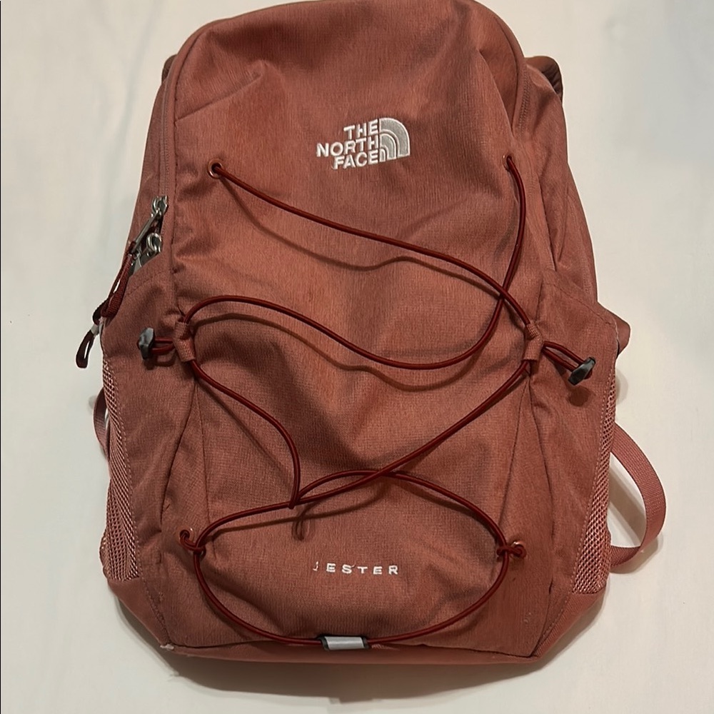 The North Face Jester Backpack in Rust Red